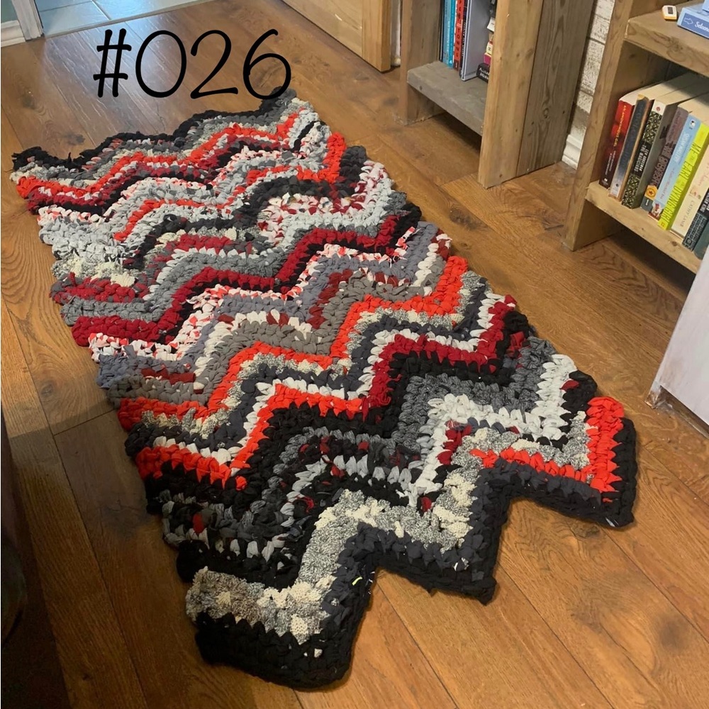 Fabric crochet rug. Made with upcycled fabric. Save the planet and look great !